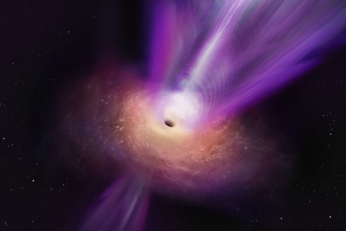 Ученые показали уникальный снимок черной дыры с газом и струями
